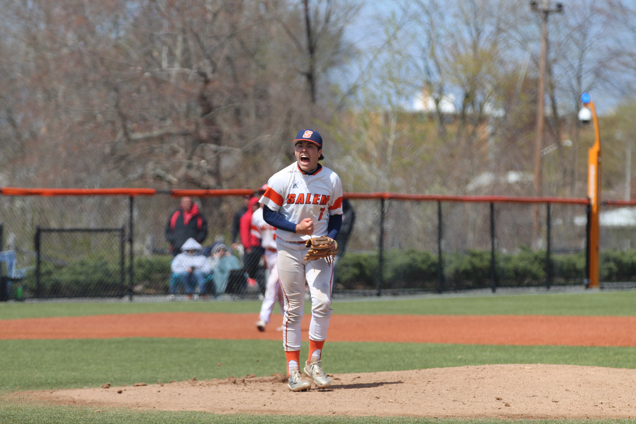 Salem State Pitcher Nolan Currier showing excitement after a play.
